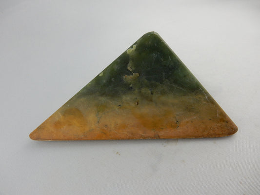 Triangular polished cut of multi-colored "Marsden" locality of NZ greenstone - distinguished&nbsp;by weathered brown "skin" - part natural stream worn/part cut/polished