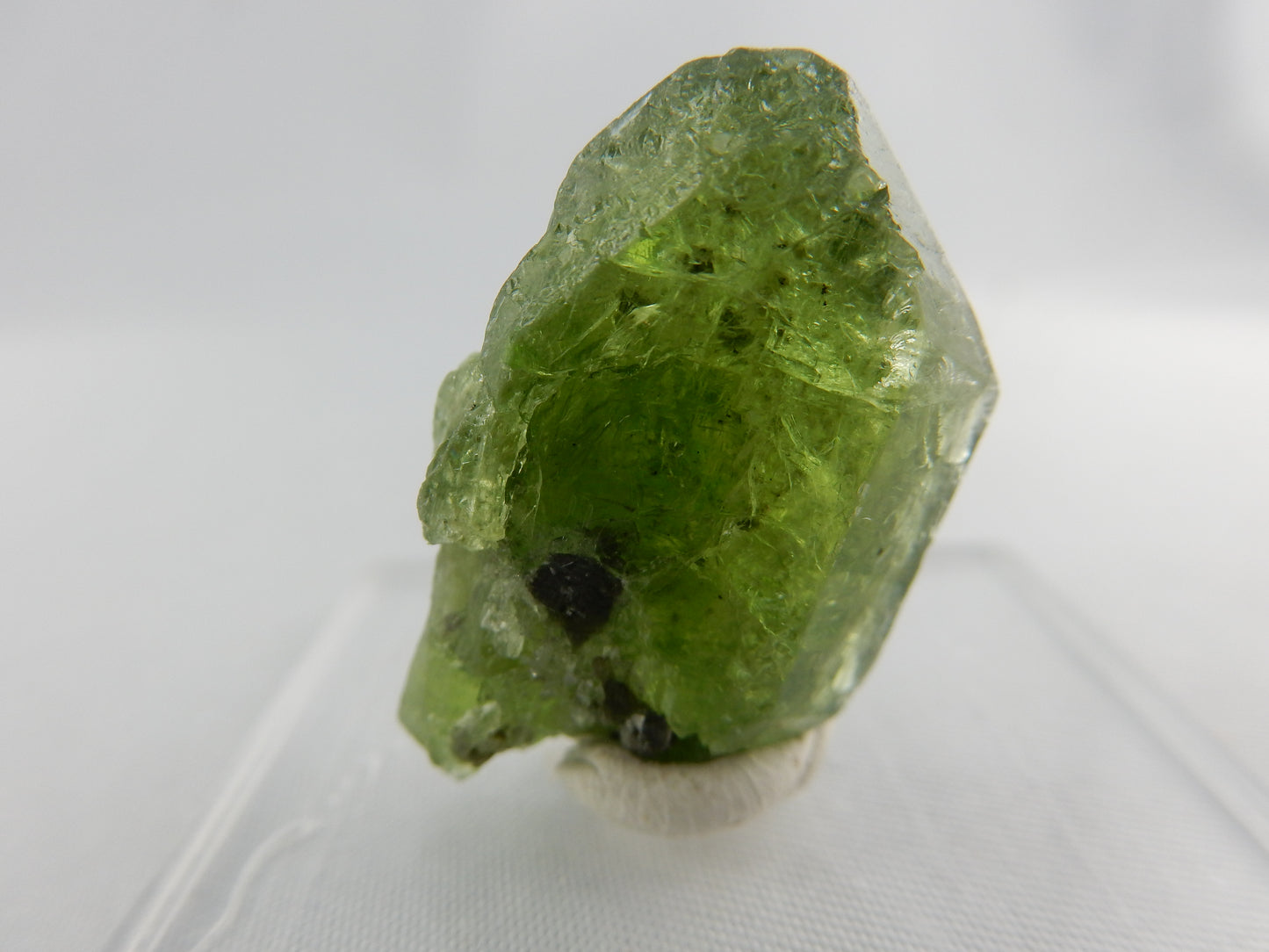single (Gem Olivine) Peridot crystal - intense apple-green crystal point, well terminated