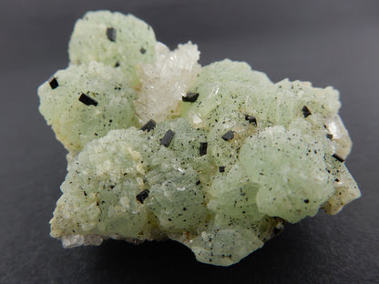 balls of green Prehnite with speckles of rare Babingtonite and nice sparkly quartz cluster as well