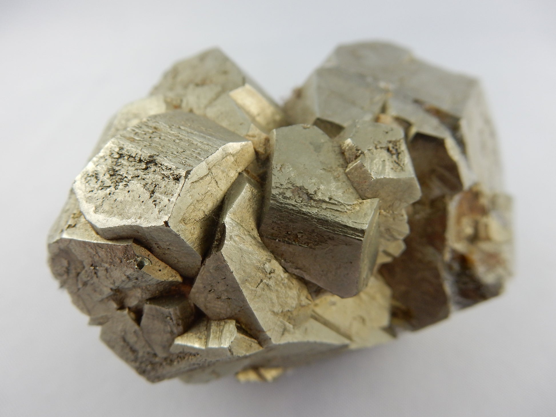 big shiny cluster of dodecahedrons of Pyrite - classic material from Peru