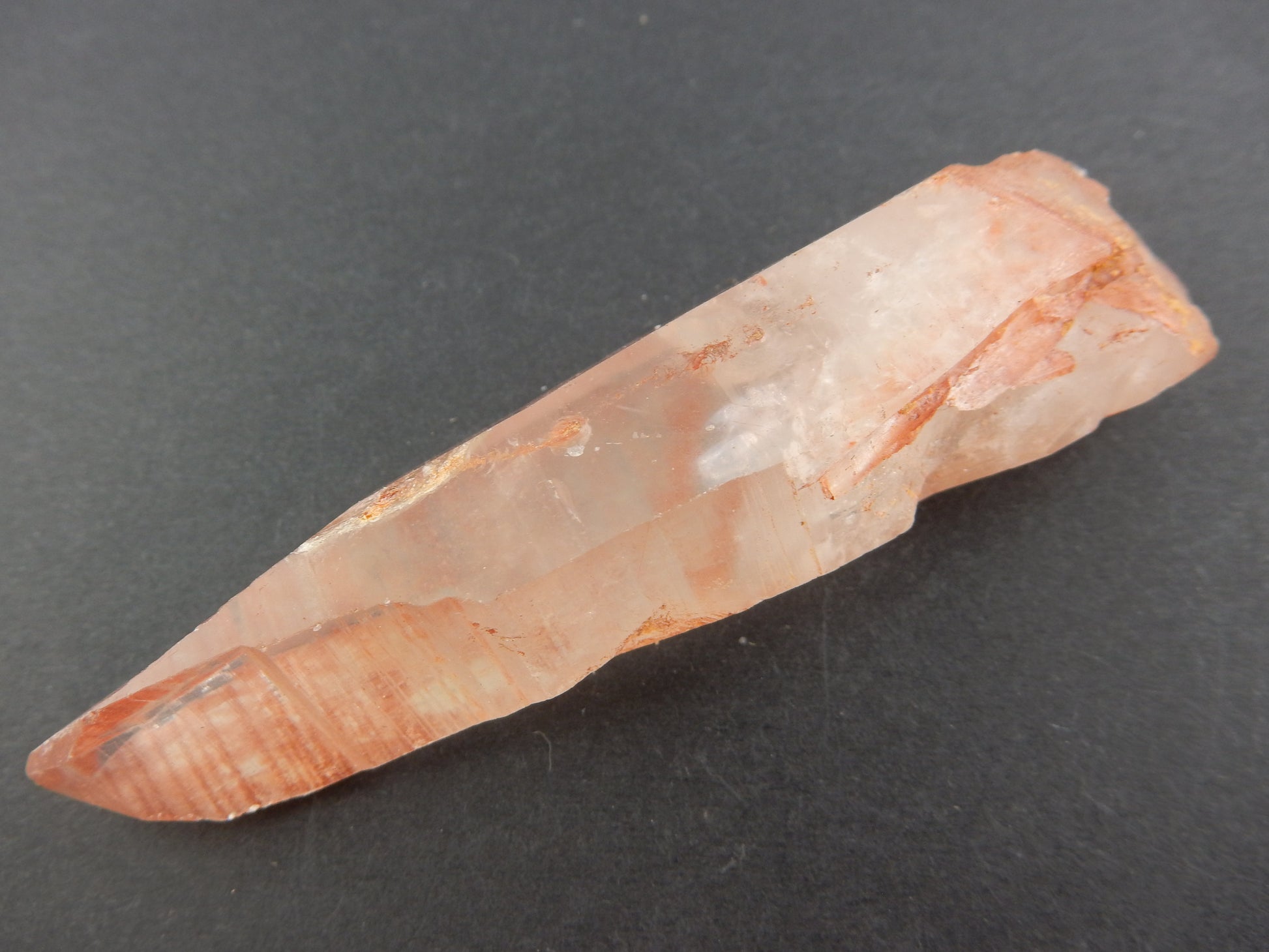 hematite quartz, single perfect tip of trigonal termination, coated with red hematite, healer's tool gift from nature