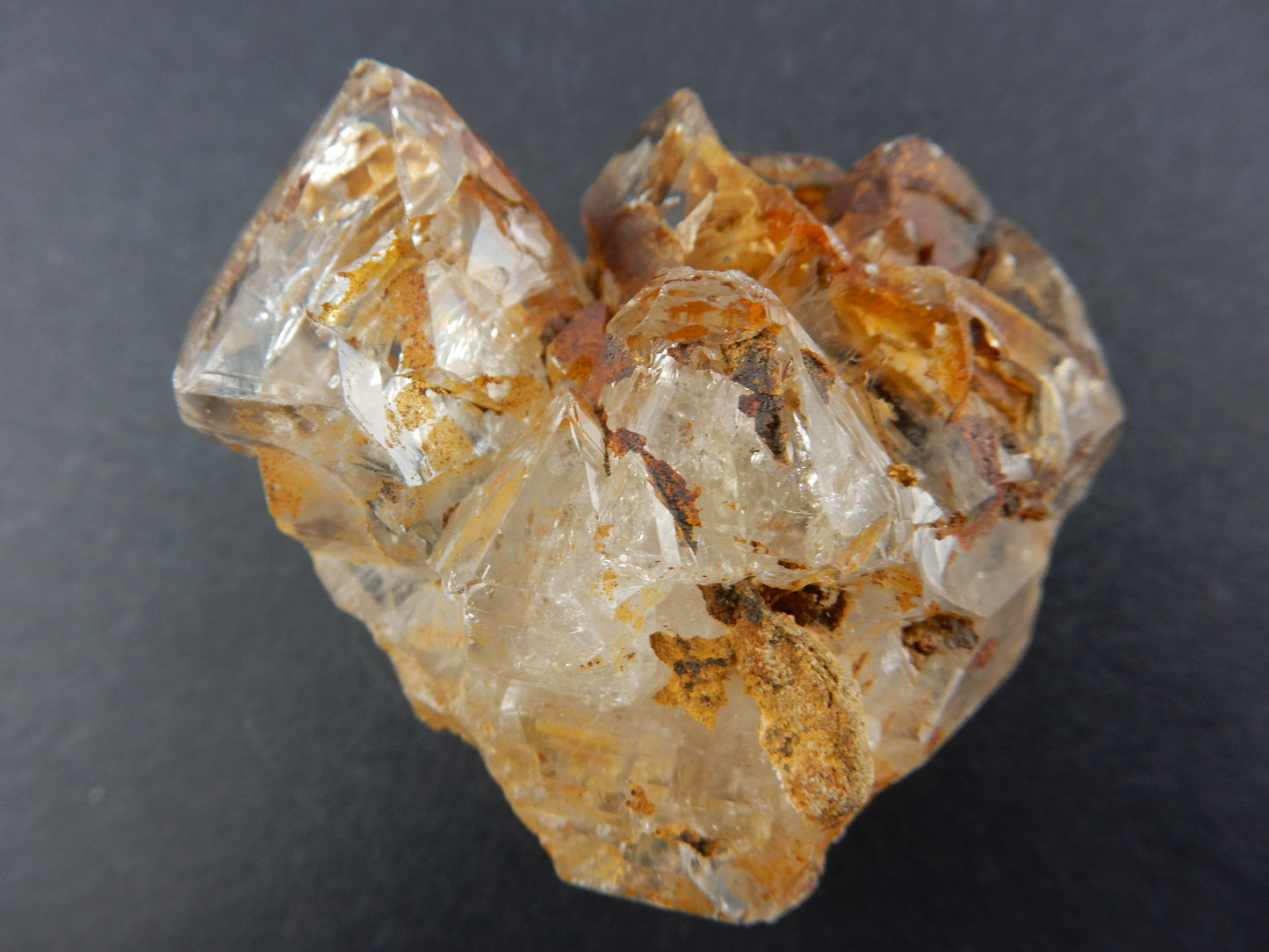 gemmy Fenster Quartz point - clay inclusions and perfect termination