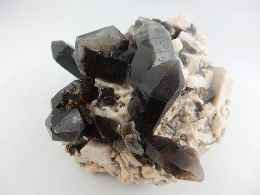 Showy dark black "morion" gemmy double terminated Quartz cluster on pink terminated feldspar
