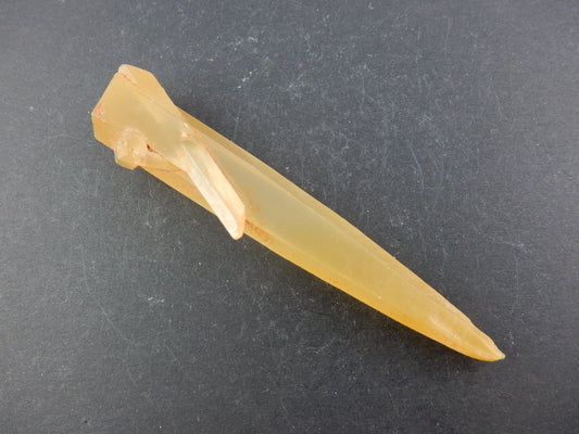 Sharp orange laser quartz or wand, with small "sidecar" crystal