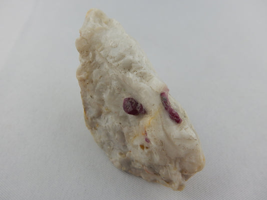 multiple double-terminated Ruby cluster with hematite inclusions at tips - multiple "sidecar" crystals all double terminated
