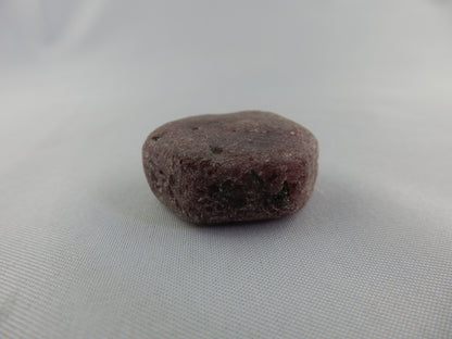 Single complete crystal with "history triangle timekeeper" faces