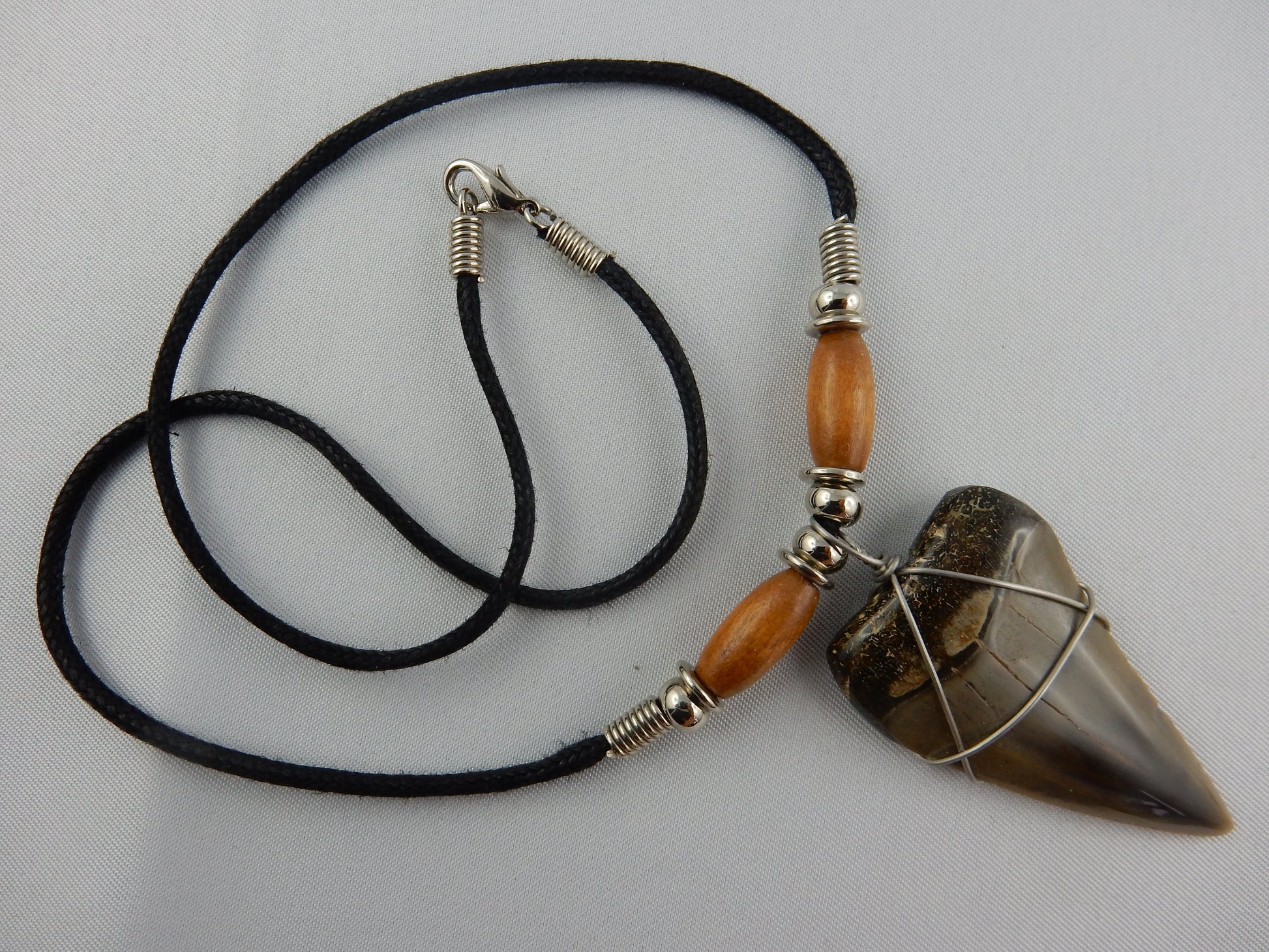 big complete grey/brown megladon tooth - w/brown wooden beads - 30 million years old - necklace