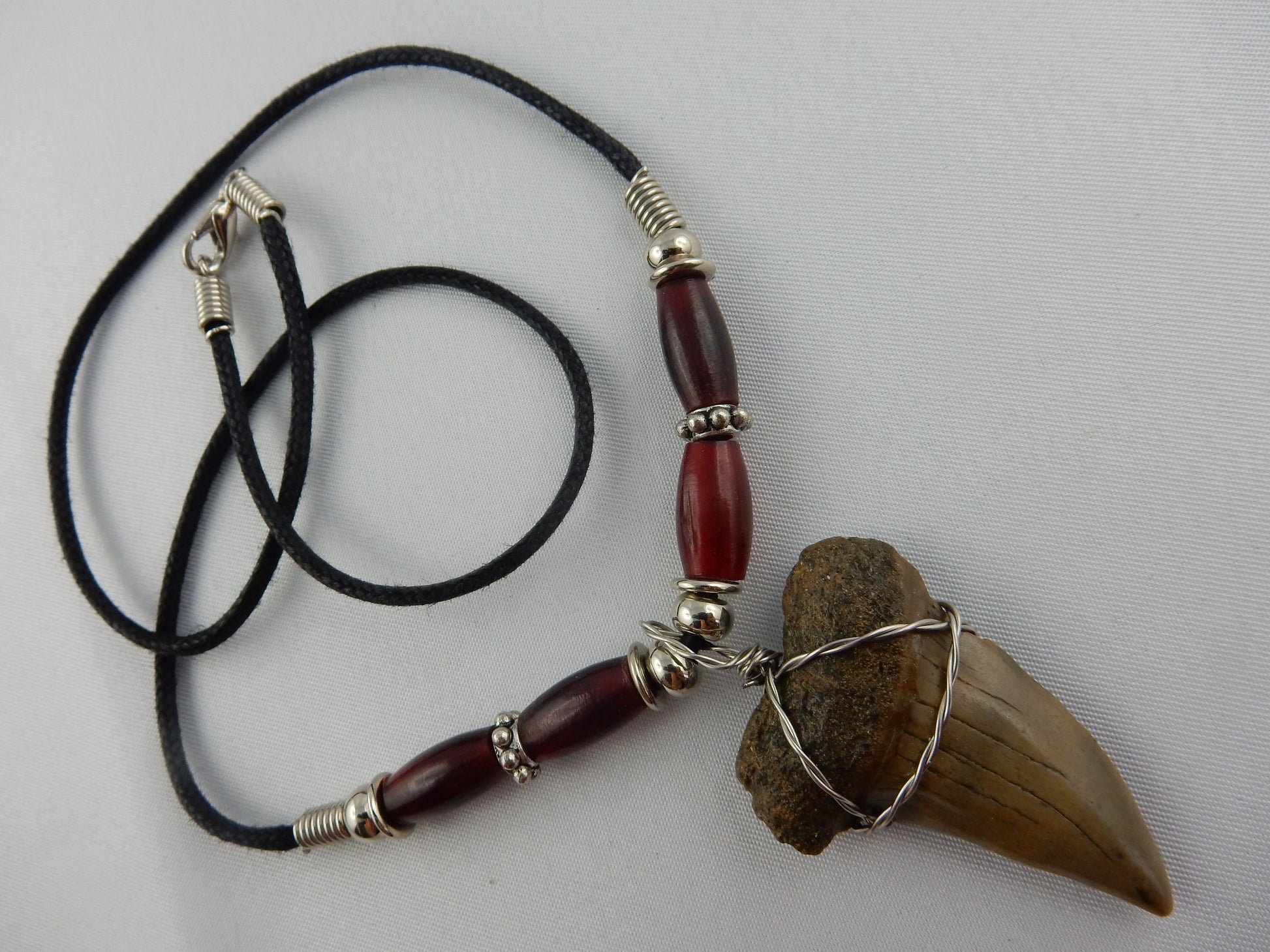 nicely curved complete megladon tan tooth - w/blood red carnelian gem beads - 30 million years old - necklace