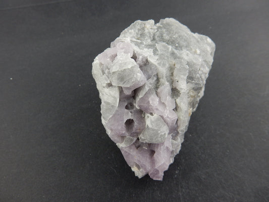 Nice specimen of purple Scapolite - interesting natural erosion of crystals
