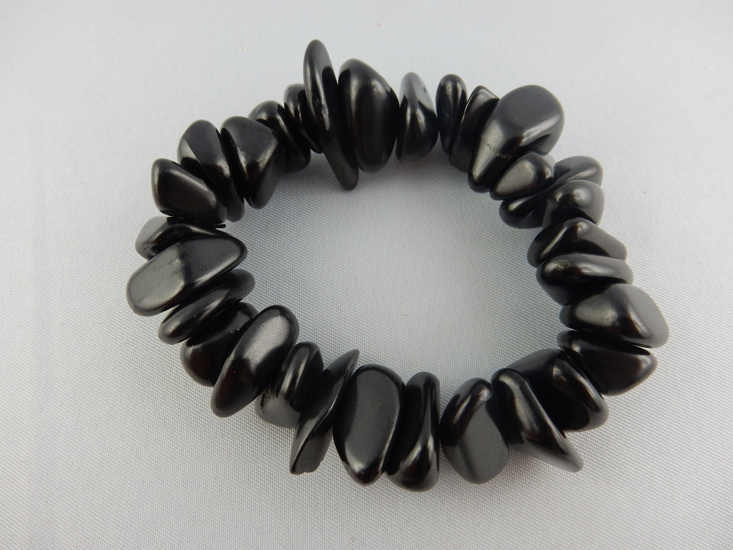 Genuine "Elite" Shungite tumbled bead bracelet on elastic