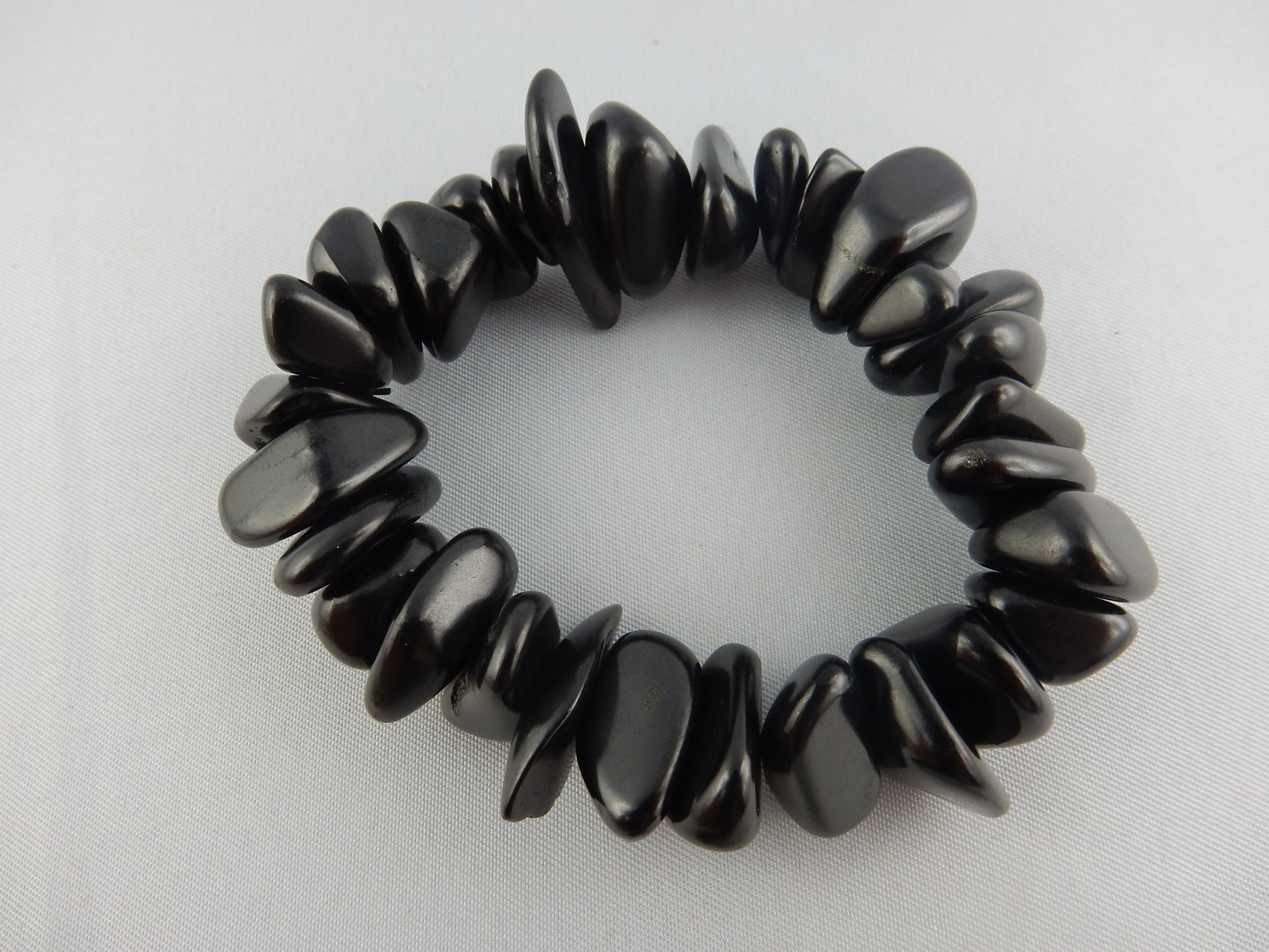 Genuine "Elite" Shungite tumbled bead bracelet on elastic