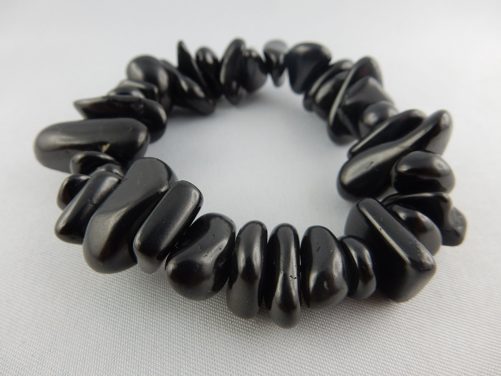 Genuine "Elite" Shungite tumbled bead bracelet on elastic