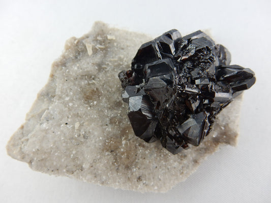 ultimate Sphalerite "flower cluster" on bed of dolomite - benchmark specimen from famous Elmwood Mine