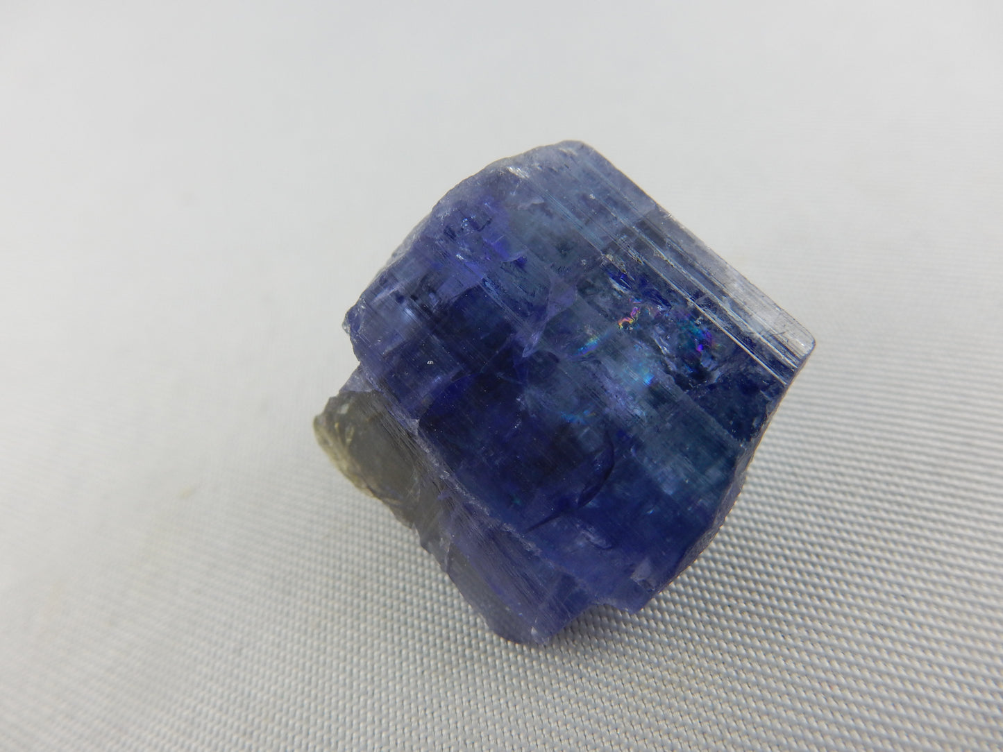Gorgeous multi-color purple-blue-green - a fracture of a parent crystal
