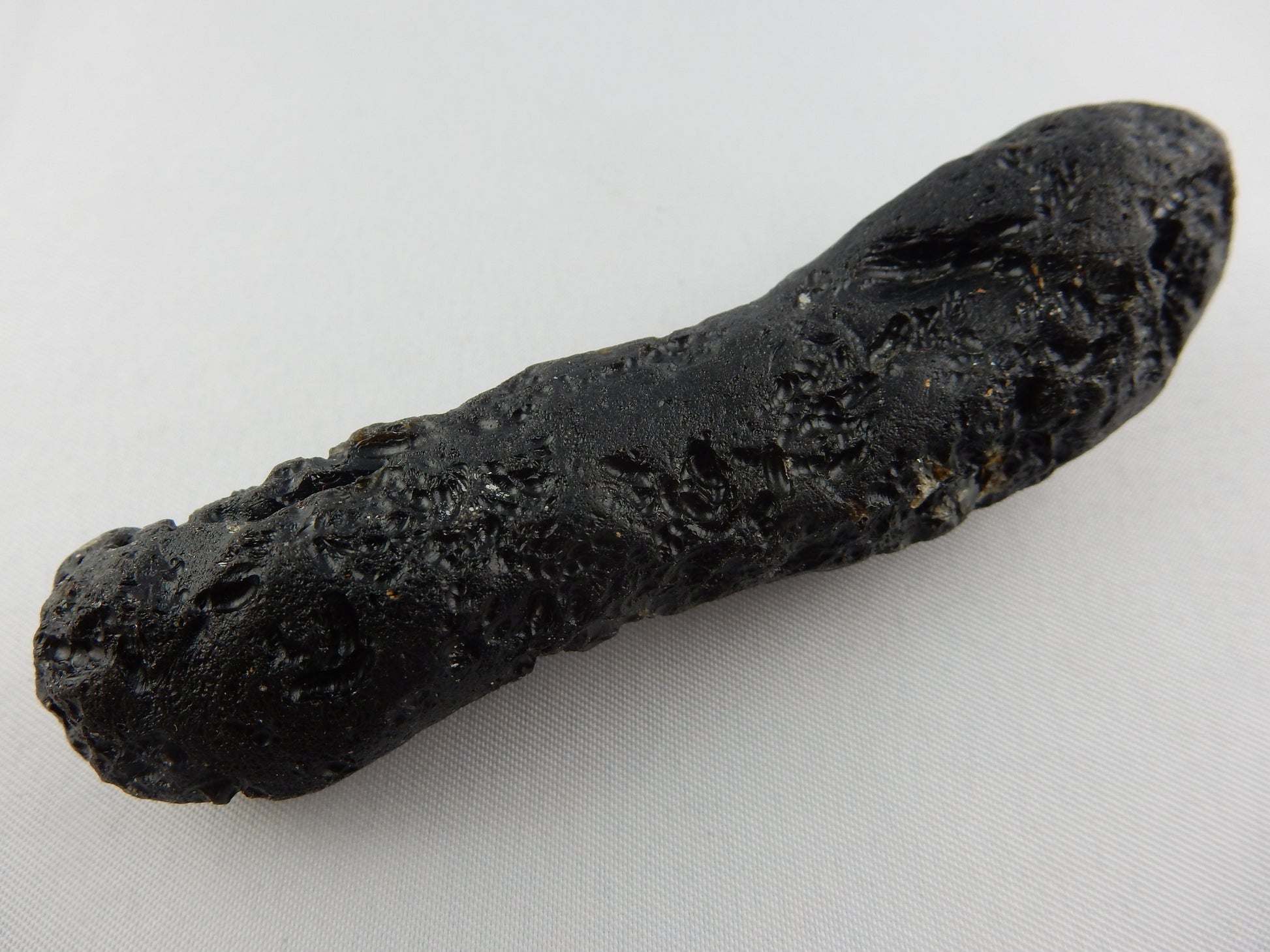 "Indochine" classic tektite from huge strewn-field Thailand-Asia - big dumb-bell shaped from spinning in air