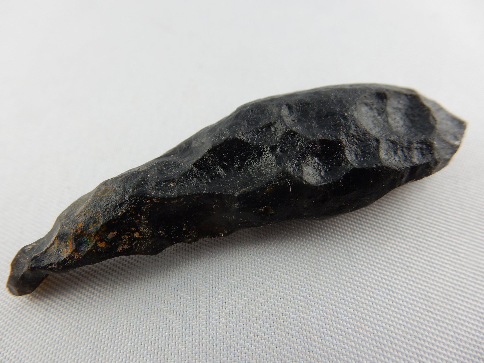 "Indochine" classic tektite from huge strewn-field Thailand-Asia - classic "aero-drop" beaming back to earth