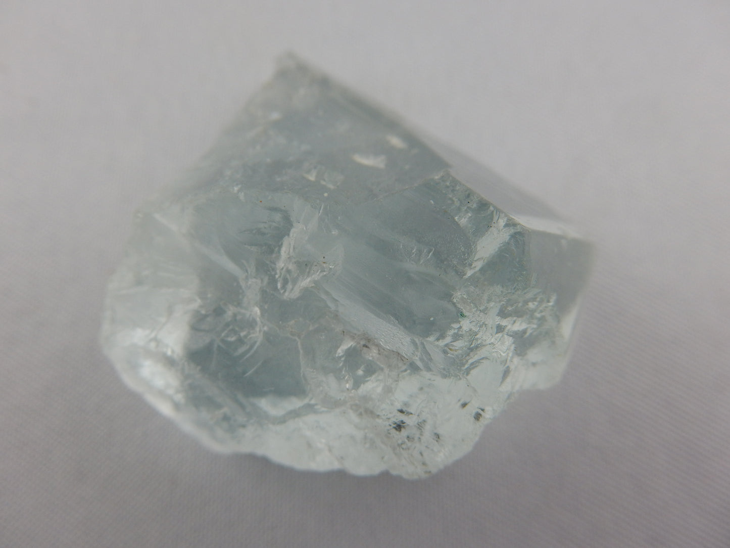 Topaz - gorgeous gemmy facet-quality clear blue, unique multiple termination faces. "floater" with healed faces