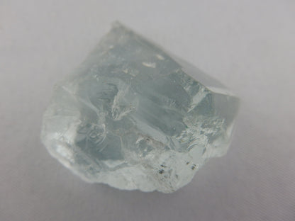 Topaz - gorgeous gemmy facet-quality clear blue, unique multiple termination faces. "floater" with healed faces