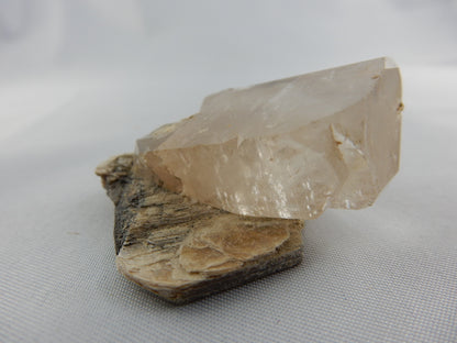 Topaz - large blocky complete terminations, classic amber, on plate of muscovite