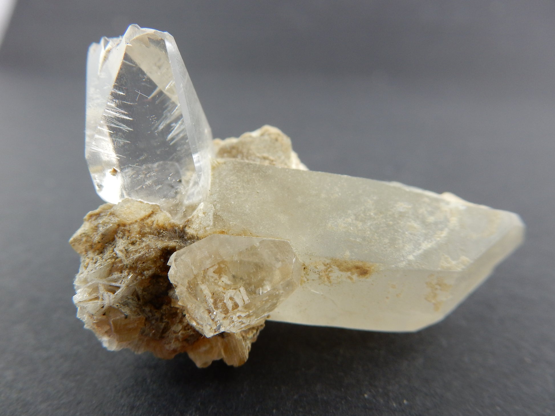 gorgeous etched-sharp terminated single gemmy complete (unheated) Topaz crystal growing off a terminated quartz base