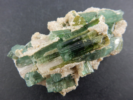 special "blue-green" Paraiba coloured cluster of gemmy crystals - largest with red watermelon centre