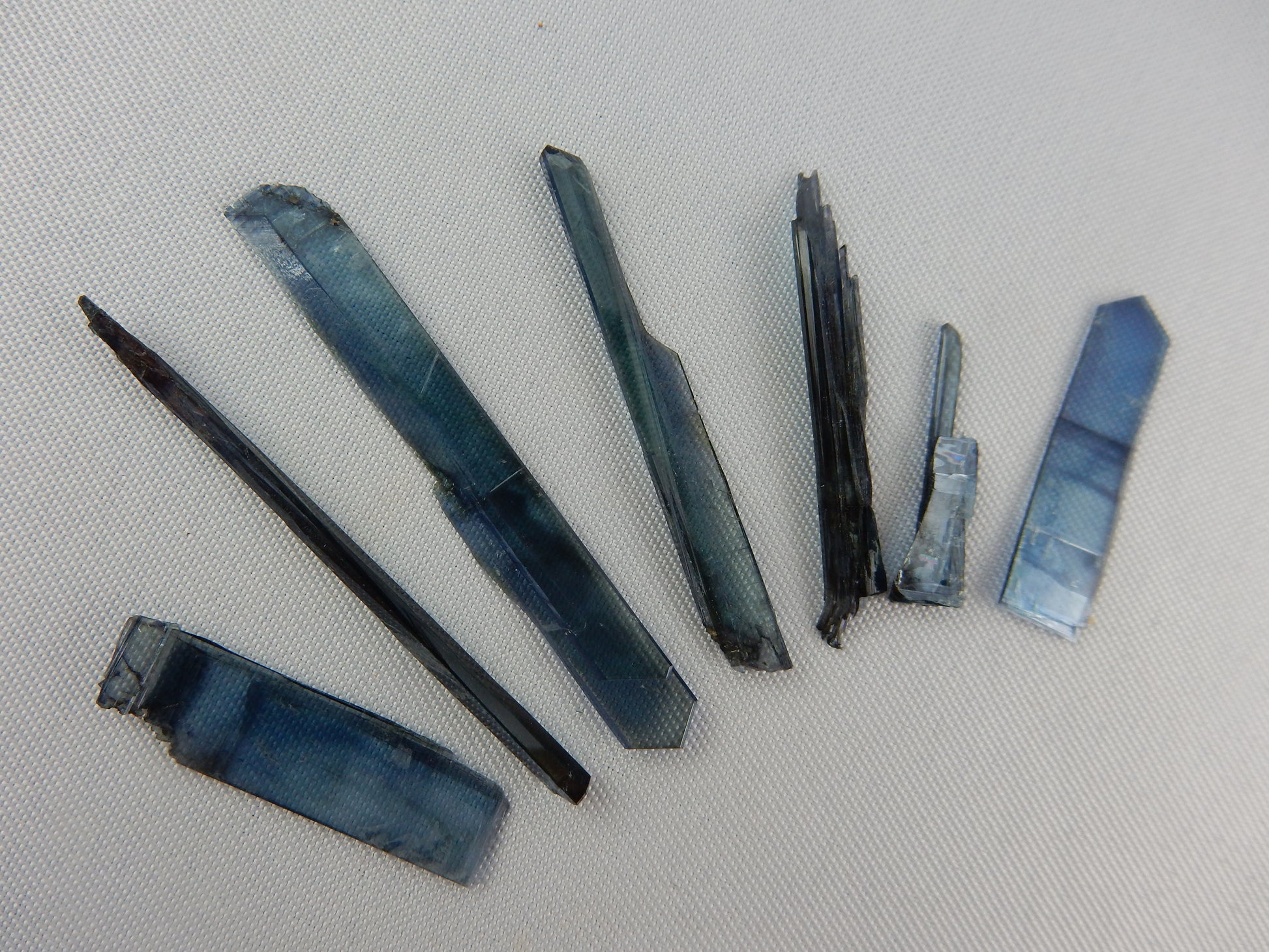 delicate gemmy multi-coloured iridescent blades of Vivianite
