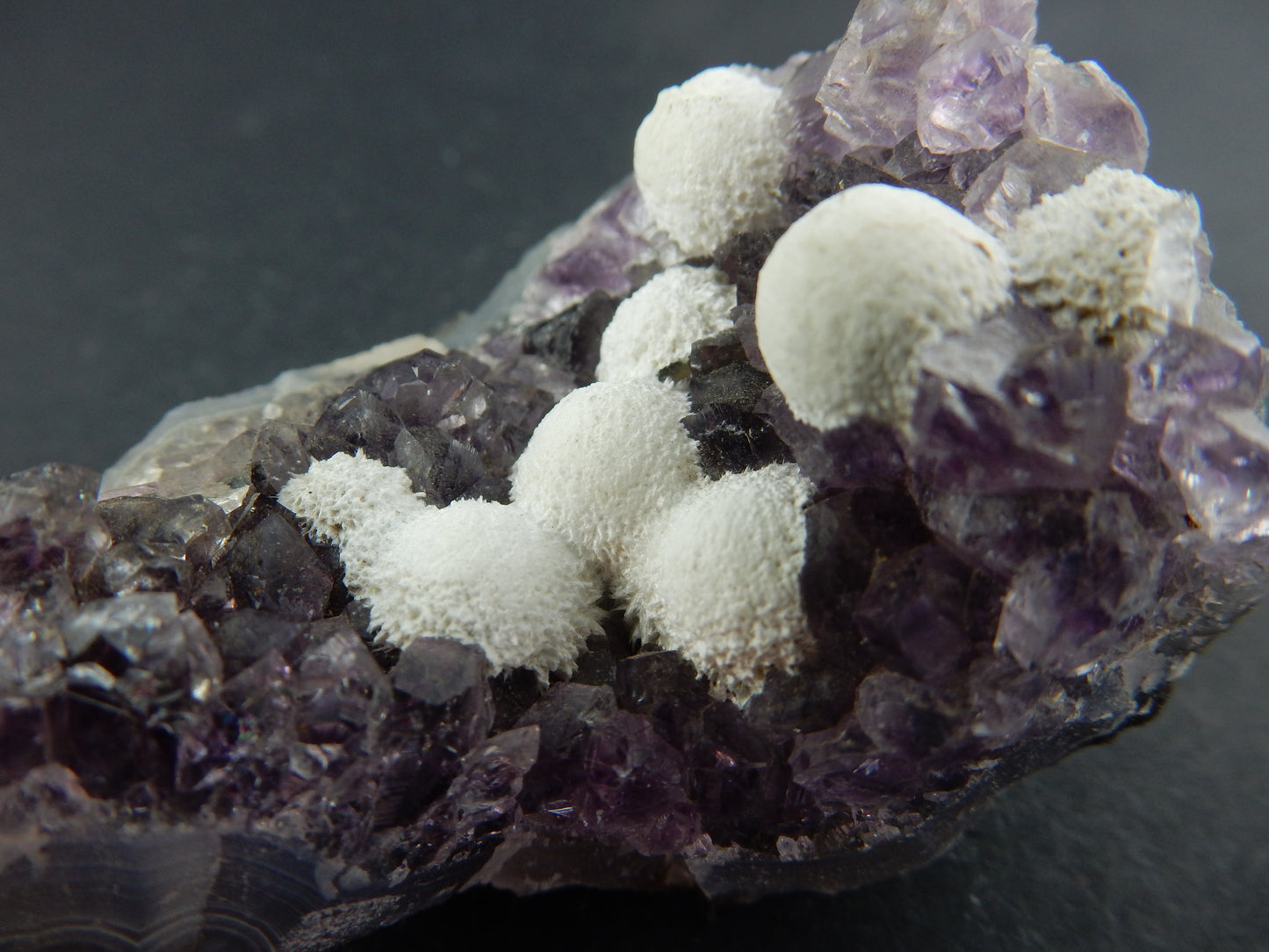 Okenite on Amethyst