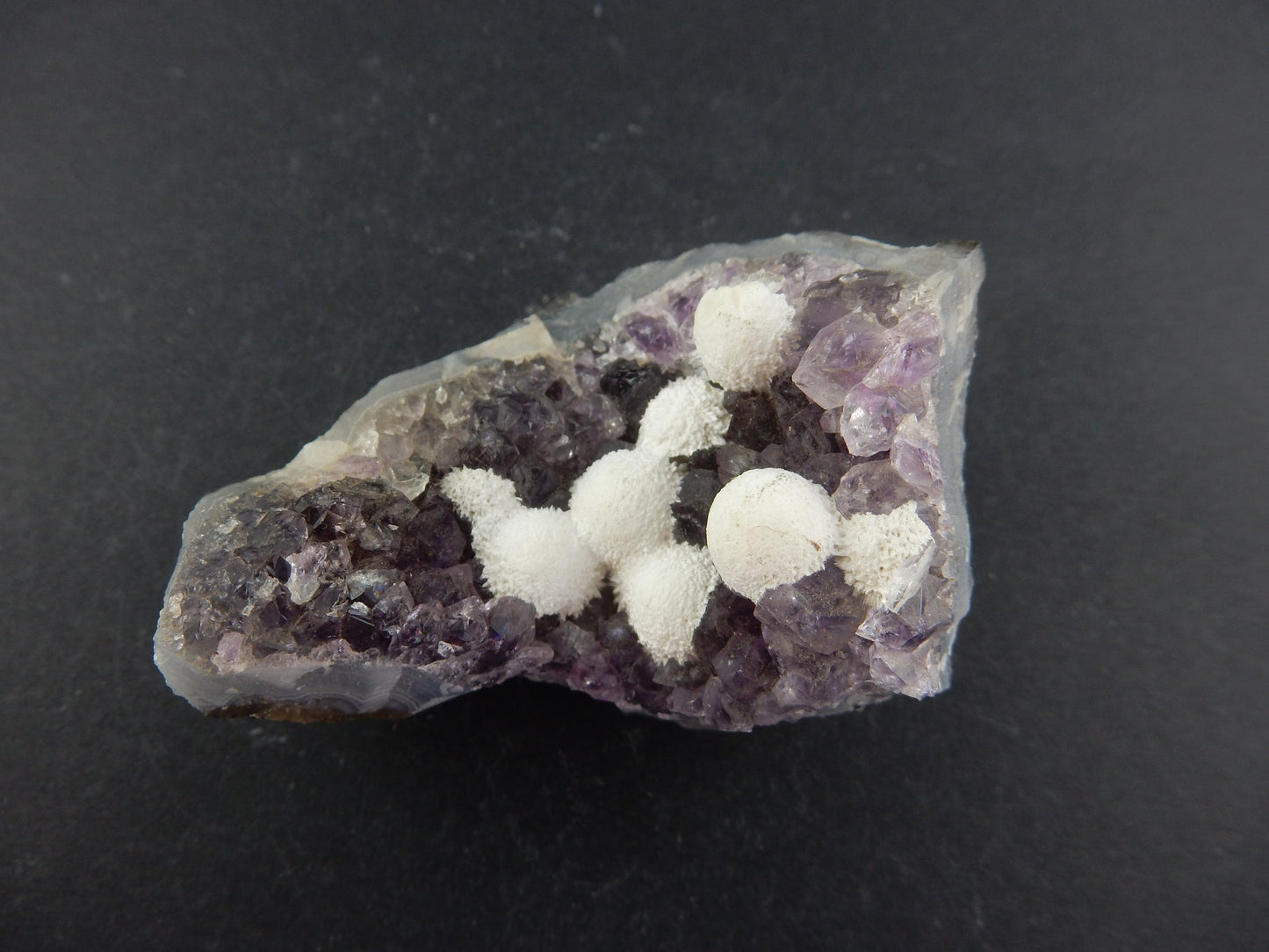 Okenite on Amethyst